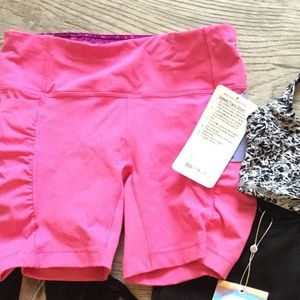Bright pink Lulu Speed track short and free tank!